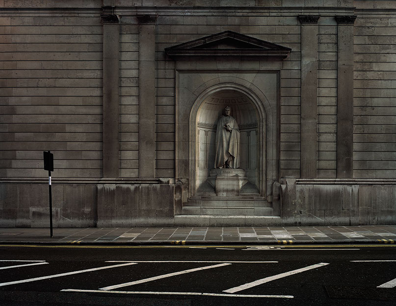 A photograph from John Riddy's series 'Low Relief - Photographs of London' of the statue of Sir John Soane at the Bank of England